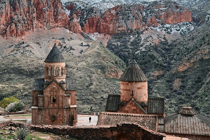 From Yerevan: Khor Virap, Noravank, Jermuk, and Areni Tour - Noravank’s red-rock setting in Vayots Dzor