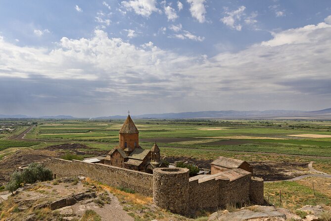 Khor Virap, Noravank Private Tour with Optional Wine Tasting - Noravank beneath the red volcanic cliffs